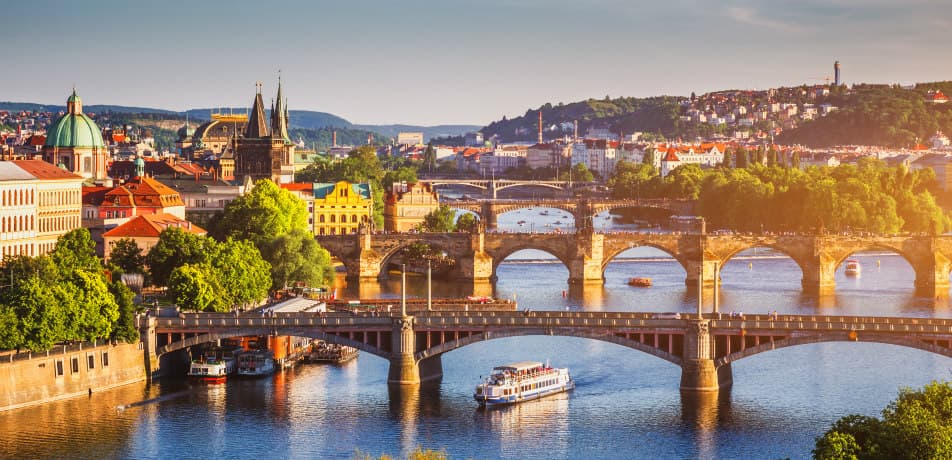 Aerial view of the Old Town pier architecture and Charles Bridge over Vltava river in Prague, Czech Republic / DaLiu/iStock